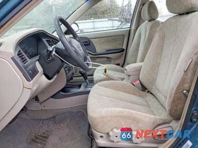Zdjęcie 7 z 12 samochodu: 2002 HYUNDAI ELANTRA GLS VIN:KMHDN45D82U323466 - miniatura