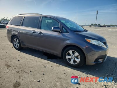 Czwarte zdjęcie samochodu z boku: 2011 TOYOTA SIENNA LE 8-PASSENGER VIN:5TDKK3DC0BS085902 - miniatura
