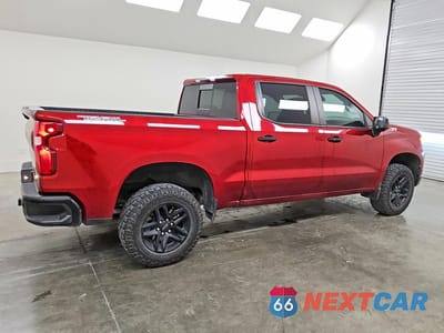 Trzecie zdjęcie samochodu z tyłu: 2023 CHEVROLET SILVERADO K1500 LT TRAIL BOSS VIN:3GCUDFED7PG213537 - miniatura