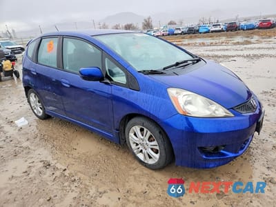 Czwarte zdjęcie samochodu z boku: 2010 HONDA FIT SPORT VIN:JHMGE8H48AS023312 - miniatura