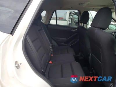 Zdjęcie 11 z 14 samochodu: 2016 MAZDA CX-5 TOURING VIN:JM3KE4CYXG0786300 - miniatura
