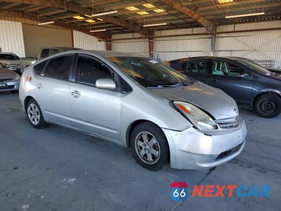 Czwarte zdjęcie samochodu z boku: 2004 TOYOTA PRIUS BASE VIN:JTDKB20U240115013 - miniatura