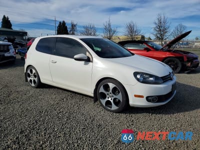 Czwarte zdjęcie samochodu z boku: 2011 VOLKSWAGEN GOLF VIN:WVWMM7AJ2BW296614 - miniatura