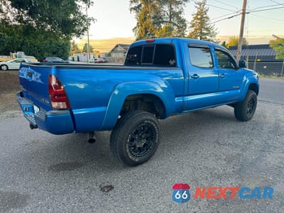 Czwarte zdjęcie samochodu z boku: 2006 TOYOTA TACOMA V6 VIN:5TEMU52N36Z150043 - miniatura