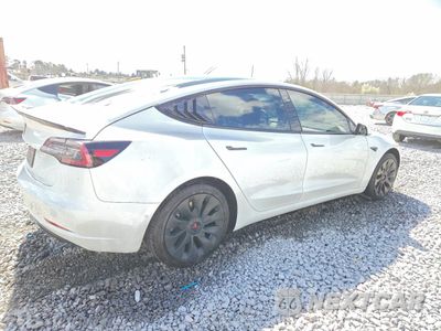 Trzecie zdjęcie samochodu z tyłu: 2021 TESLA MODEL 3 VIN:5YJ3E1EA7MF986978 - miniatura