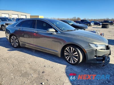 Czwarte zdjęcie samochodu z boku: 2017 LINCOLN MKZ SELECT VIN:3LN6L5C92HR605363 - miniatura