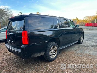 Czwarte zdjęcie samochodu z boku: 2015 CHEVROLET SUBURBAN K1500 LS VIN:1GNSKHKCXFR162688 - miniatura