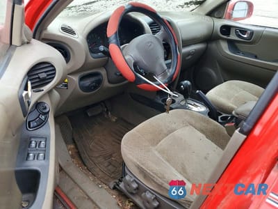 Zdjęcie 8 z 11 samochodu: 2004 HYUNDAI SANTA FE GLS VIN:KM8SC73E84U577143 - miniatura