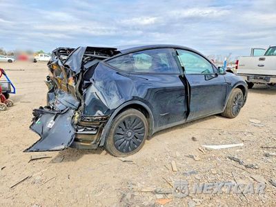 Trzecie zdjęcie samochodu z tyłu: 2023 TESLA MODEL Y VIN:7SAYGDEE8PF834963 - miniatura
