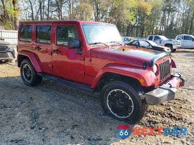 Czwarte zdjęcie samochodu z boku: 2012 JEEP WRANGLER UNLIMITED SAHARA VIN:1C4BJWEG1CL250624 - miniatura