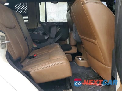 Zdjęcie 10 z 11 samochodu: 2013 JEEP WRANGLER UNLIMITED SAHARA VIN:1C4BJWEG5DL554329 - miniatura