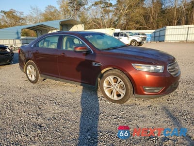 Czwarte zdjęcie samochodu z boku: 2016 FORD TAURUS VIN:1FAHP2E82GG107518 - miniatura