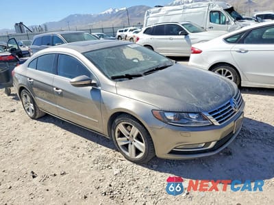 Czwarte zdjęcie samochodu z boku: 2013 VOLKSWAGEN CC SPORT VIN:WVWBN7AN1DE508936 - miniatura