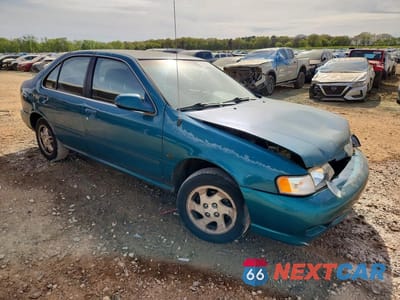 Czwarte zdjęcie samochodu z boku: 1999 NISSAN SENTRA XE VIN:3N1AB41D7XL087077 - miniatura