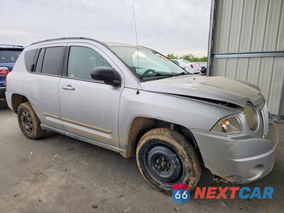 Czwarte zdjęcie samochodu z boku: 2010 JEEP COMPASS SPORT 4D SUV VIN:1J4NT4FB8AD560432 - miniatura