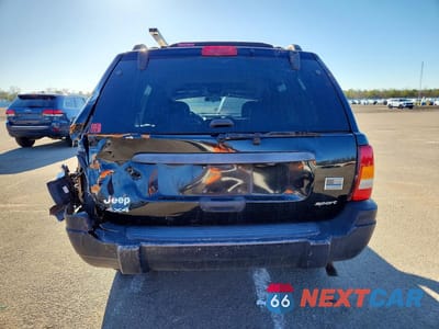 Zdjęcie 6 z 13 samochodu: 2002 JEEP GRAND CHEROKEE SPORT VIN:1J8GW38S42C236293 - miniatura
