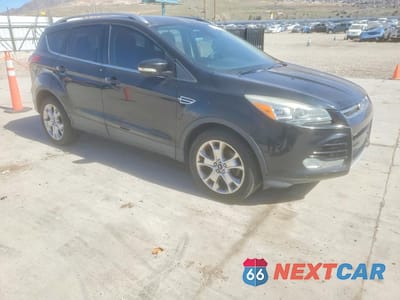 Czwarte zdjęcie samochodu z boku: 2014 FORD ESCAPE TITANIUM VIN:1FMCU0J92EUE06887 - miniatura