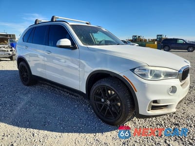 Czwarte zdjęcie samochodu z boku: 2014 BMW X5 XDRIVE35I VIN:5UXKR0C55E0H28685 - miniatura