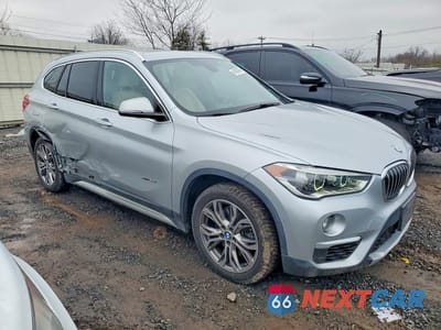 Czwarte zdjęcie samochodu z boku: 2016 BMW X1 XDRIVE28I VIN:WBXHT3Z3XG4A51717 - miniatura