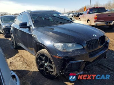 Czwarte zdjęcie samochodu z boku: 2012 BMW X6 M VIN:5YMGZ0C5XCLL29682 - miniatura