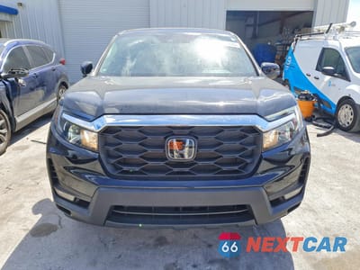 Piąte zdjęcie samochodu w środku: 2024 HONDA PASSPORT EXL VIN:5FNYF8H59RB004725 - miniatura