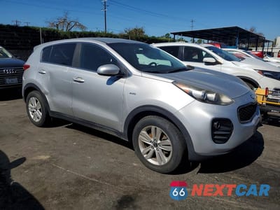 Czwarte zdjęcie samochodu z boku: 2017 KIA SPORTAGE LX VIN:KNDPMCAC5H7121235 - miniatura