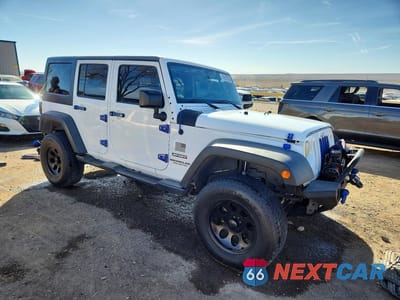 Czwarte zdjęcie samochodu z boku: 2016 JEEP WRANGLER UNLIMITED SPORT VIN:1C4BJWDG2GL209801 - miniatura
