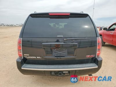 Zdjęcie 6 z 13 samochodu: 2011 GMC YUKON XL DENALI VIN:1GKS2MEF6BR398986 - miniatura