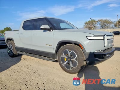 Czwarte zdjęcie samochodu z boku: 2022 RIVIAN R1T ADVENTURE VIN:7FCTGAAA3NN015814 - miniatura
