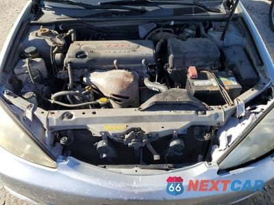 Zdjęcie 11 z 12 samochodu: 2003 TOYOTA CAMRY LE VIN:4T1BE32K03U691436 - miniatura