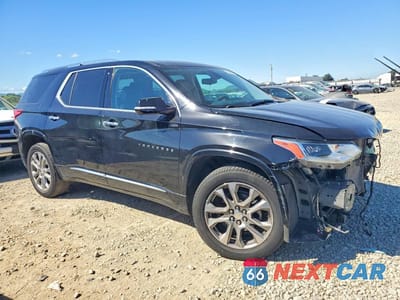 Czwarte zdjęcie samochodu z boku: 2019 CHEVROLET TRAVERSE PREMIER VIN:1GNERKKW7KJ288399 - miniatura