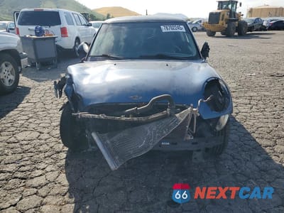Piąte zdjęcie samochodu w środku: 2011 MINI COOPER VIN:WMWSU3C51BT097486 - miniatura
