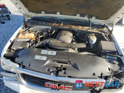 Zdjęcie 12 z 13 samochodu: 2003 GMC YUKON VIN:1GKEC13Z53R243305 - miniatura