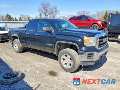 Czwarte zdjęcie samochodu z boku: 2015 GMC SIERRA K1500 VIN:1GTV2TEC1FZ158825 - miniatura
