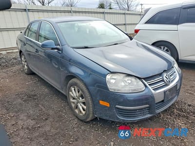 Czwarte zdjęcie samochodu z boku: 2010 VOLKSWAGEN JETTA SE VIN:3VWRZ7AJ4AM034712 - miniatura