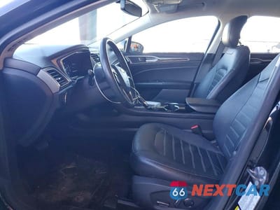 Zdjęcie 7 z 12 samochodu: 2015 FORD FUSION SE HYBRID VIN:3FA6P0LU9FR128448 - miniatura
