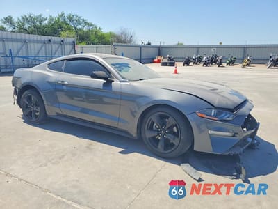 Czwarte zdjęcie samochodu z boku: 2022 FORD MUSTANG VIN:1FA6P8TH4N5130286 - miniatura