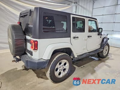 Trzecie zdjęcie samochodu z tyłu: 2015 JEEP WRANGLER SPORT VIN:1C4BJWDG3FL556536 - miniatura