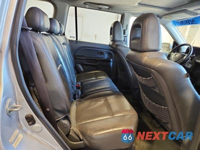 Zdjęcie 10 z 12 samochodu: 2005 HONDA PILOT EXL VIN:2HKYF18535H523210 - miniatura