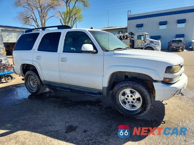 Czwarte zdjęcie samochodu z boku: 2004 CHEVROLET TAHOE K1500 VIN:1GNEK13Z54R151988 - miniatura