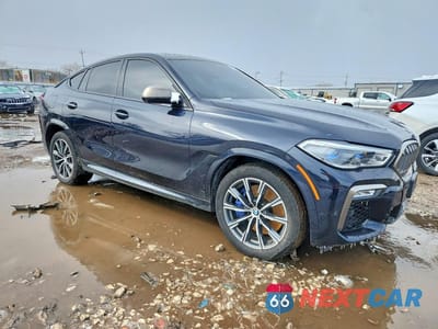 Czwarte zdjęcie samochodu z boku: 2020 BMW X6 M50I VIN:5UXCY8C00L9D66297 - miniatura