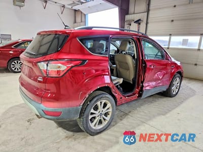 Trzecie zdjęcie samochodu z tyłu: 2018 FORD ESCAPE SEL VIN:1FMCU9HD3JUD15524 - miniatura
