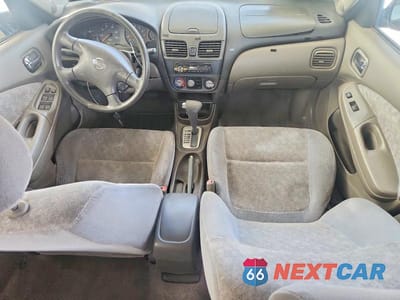 Zdjęcie 8 z 11 samochodu: 2003 NISSAN SENTRA XE VIN:3N1CB51D73L715616 - miniatura