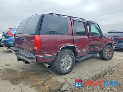 Trzecie zdjęcie samochodu z tyłu: 1999 GMC YUKON SLE VIN:1GKEK13R5XJ718538 - miniatura