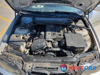 Zdjęcie 11 z 11 samochodu: 2004 BMW 325 I VIN:WBAET37434NJ42677 - miniatura