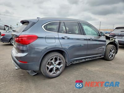 Trzecie zdjęcie samochodu z tyłu: 2018 BMW X1 SDRIVE28I VIN:WBXHU7C34J5H45172 - miniatura