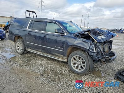 Czwarte zdjęcie samochodu z boku: 2020 GMC YUKON XL K1500 SLE VIN:1GKS2FKC5LR206271 - miniatura