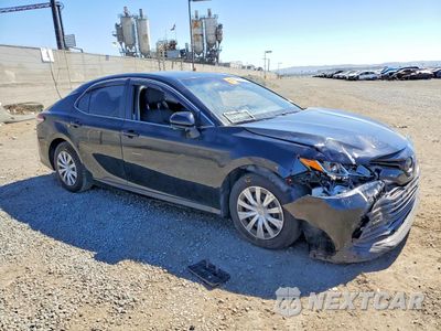 Czwarte zdjęcie samochodu z boku: 2019 TOYOTA CAMRY HYBRID LE VIN:4T1B31HK1KU516077 - miniatura