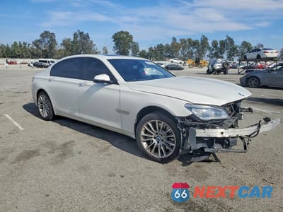 Czwarte zdjęcie samochodu z boku: 2014 BMW 750 LXI VIN:WBAYF8C57ED652666 - miniatura
