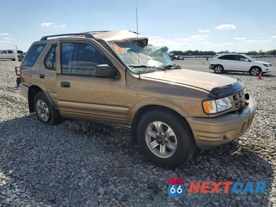 Czwarte zdjęcie samochodu z boku: 2001 ISUZU RODEO S VIN:4S2CK58W714306169 - miniatura